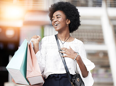 Buy stock photo Black woman, shopping bag and happy customer walking outdoor in a city for retail deal, sale or promotion. African person with gift, smile and excited about buying fashion product on urban travel