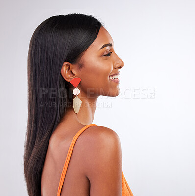 Buy stock photo Beauty, fashion and profile of Indian woman in studio with makeup, cosmetics and glamour in accessories. Smile, aesthetic and face of person on white background with glow, wellness and confidence