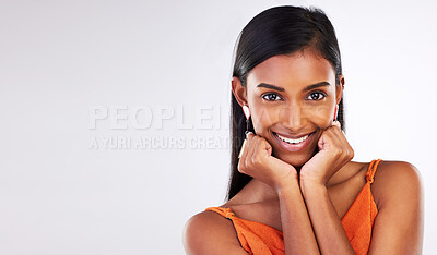 Buy stock photo Beauty, happy and portrait of Indian woman in studio with makeup, cosmetics and glamour on mockup space. Smile, aesthetic and face of person on white background with glow, wellness and confidence