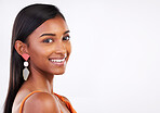 Portrait, beauty and happy woman in studio for makeup, glamour and natural cosmetics on white background. Smile, glowing skin and Indian female model face, shine and pose with body care satisfaction