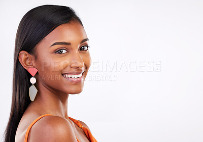 Buy stock photo Portrait, beauty and happy woman in studio for makeup, glamour and natural cosmetics on white background. Smile, glowing skin and Indian female model face, shine and pose with body care satisfaction