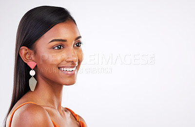 Buy stock photo Face, beauty and Indian woman in studio for makeup, glamour and natural cosmetics on white background. Smile, glowing skin and female model with confidence, shine and pose with body care satisfaction