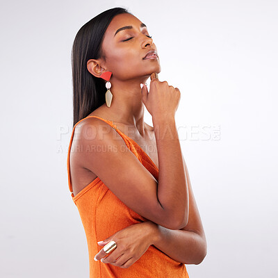 Buy stock photo Beauty, fashion and Indian woman in studio with makeup, cosmetics and glamour in accessories. Luxury style, salon aesthetic and face of person on white background with glow, wellness and confidence