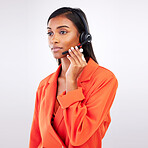Call center, listening and woman telemarketing, support and help in studio isolated on a white background. Contact us, customer service agent and sales consultant on microphone for thinking of crm