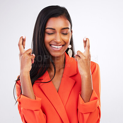 Buy stock photo Face, smile and woman with fingers crossed in studio for good luck, hope or wish on white background. Happy, excited and female model with optimistic hand emoji review ,feedback or waiting for news