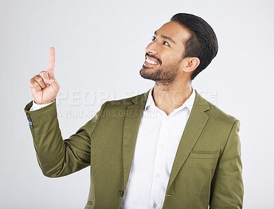 Buy stock photo Businessman, thinking and happy man pointing for promotion, deal and logo isolated in studio white background. Choice, corporate and person or employee showing advertising or news with smile