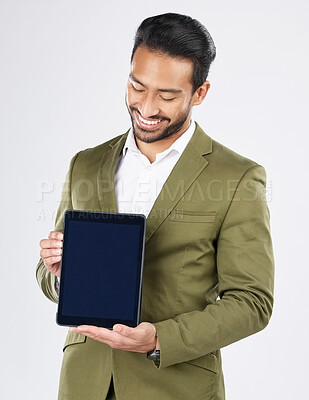 Buy stock photo Happy asian man, tablet mockup and screen in advertising against a white studio background. Businessman smile with technology display or app in marketing, advertisement or branding on mock up space