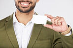 Happy man, hand and business card in advertising, marketing or branding against a white studio background. Closeup of businessman with paper or poster for contact information or services on mockup