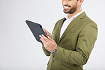 Smile, tablet and businessman search internet with technology with isolated in a studio white background. Online, planning and young person or employee working on connection or networking with app
