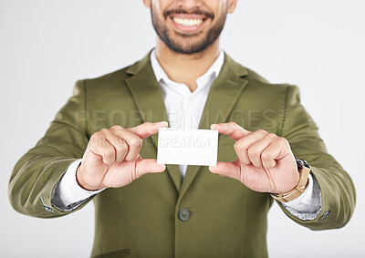 Buy stock photo Happy man, hands and business card in advertising, marketing or branding against a white studio background. Closeup of businessman with paper or poster for contact information or services on mockup