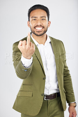 Buy stock photo Business man, middle finger and studio portrait with anger, rude and frustrated by white background. Indian entrepreneur, smile and emoji for sign language, vote and opinion with hand for conflict