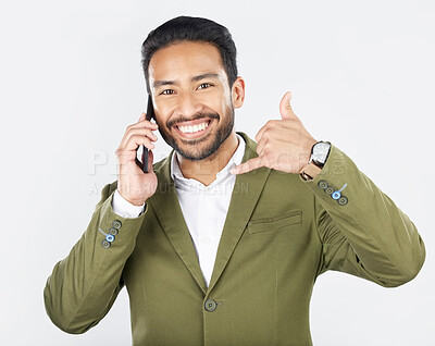 Buy stock photo Phone call, hand gesture and portrait of business man in studio for conversation, chat and communication. Networking, shaka sign and professional person on smartphone for deal on white background