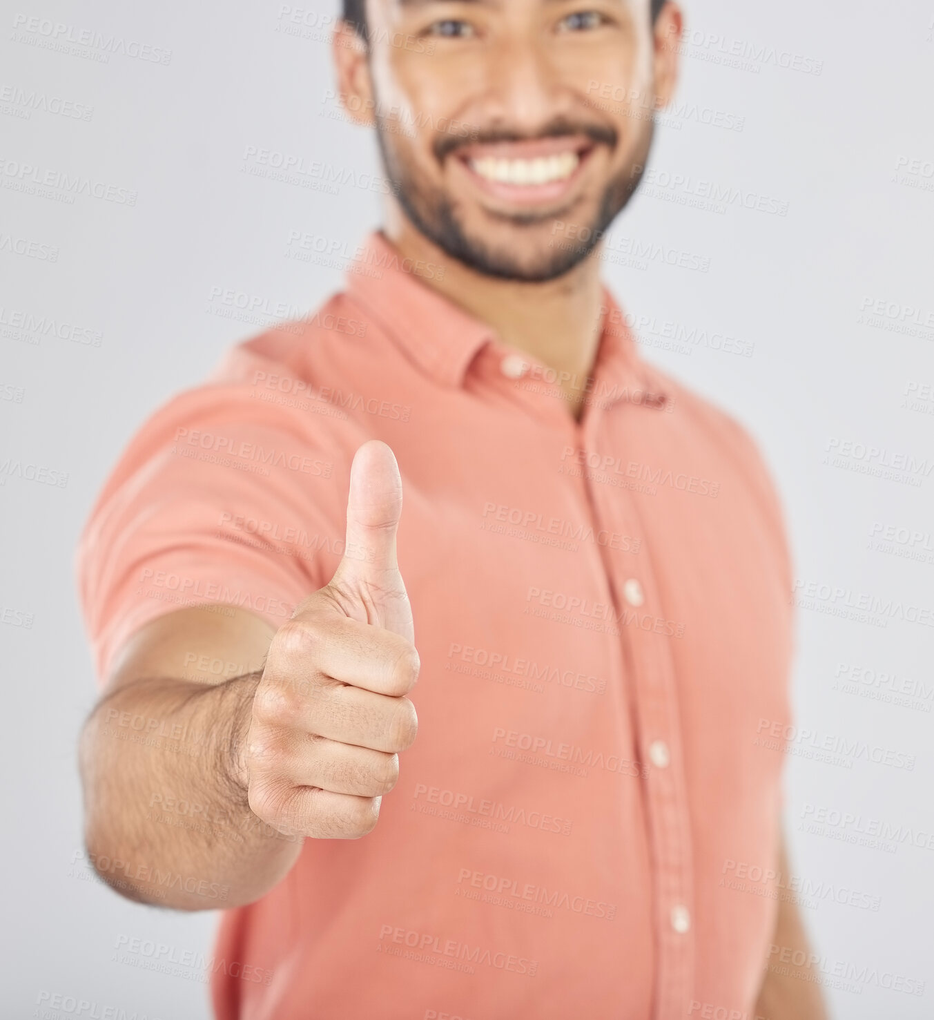 Buy stock photo Happy asian man, portrait and thumbs up in success, winning or good job against a white studio background. Male person smile with like emoji, yes sign or OK in agreement, thank you or approval