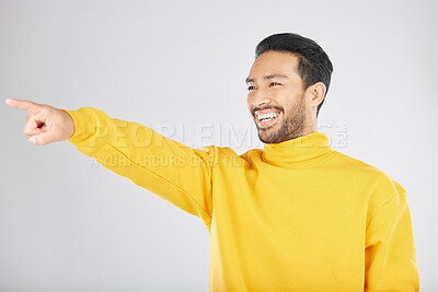 Buy stock photo Indian, man and pointing hand in studio to show fashion promotion, offer or excited for deal on white background. Choice, gesture mockup and presentation of information with person showing space