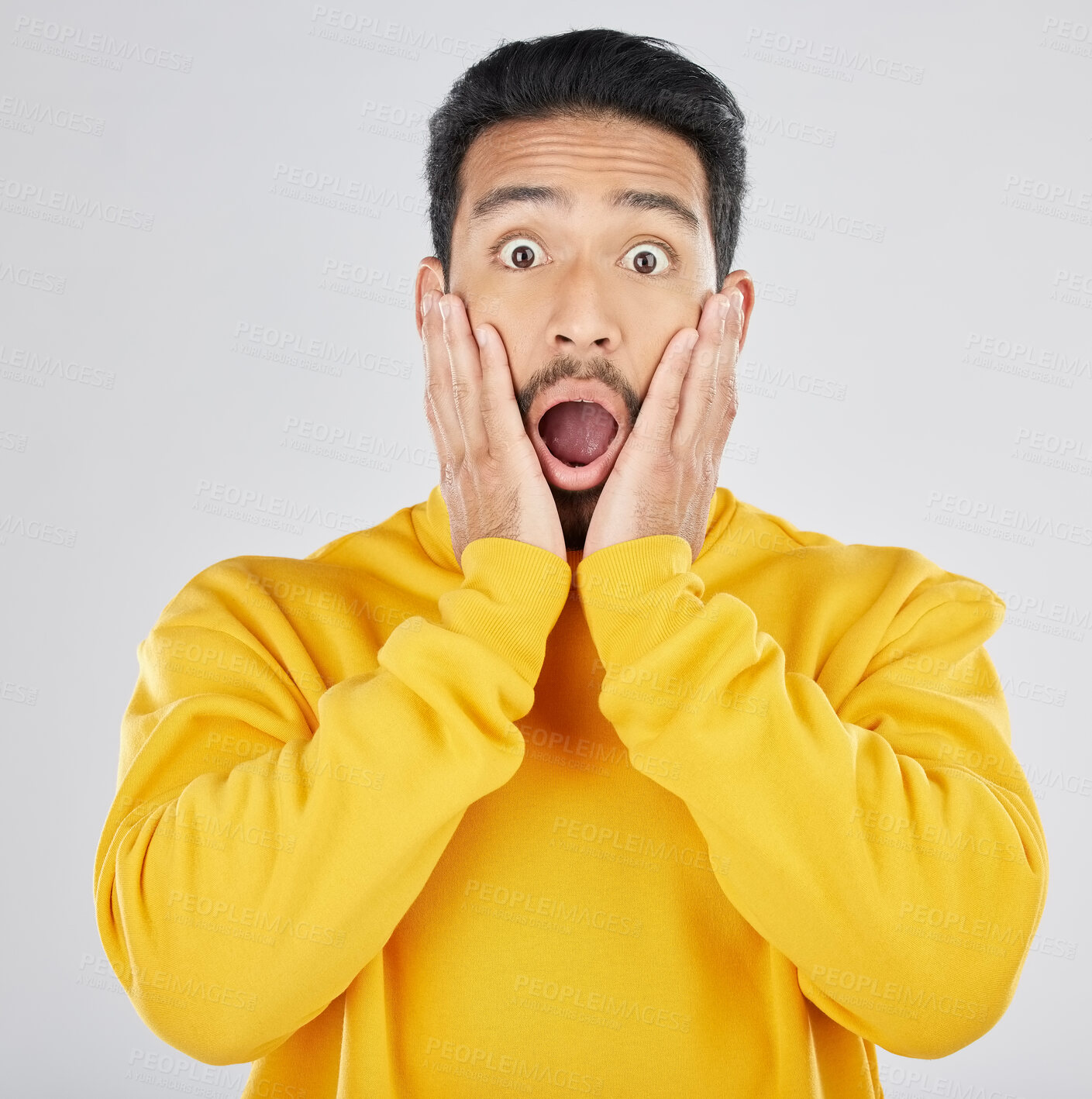 Buy stock photo Wow, news and hands on face of man in studio for omg, surprise or promo on white background. Wtf, emoji and portrait of Japanese guy model shocked by announcement, gossip info or coming soon sale
