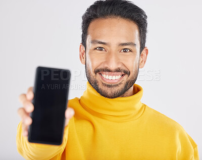Buy stock photo Portrait, phone screen and mockup by happy man in studio with space for social media or promo on white background. Smartphone, display and face of male model with app, review or coming soon sign up