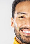 Half face, smile of man and skincare in studio isolated on a white background mockup space. Portrait, happy and natural beauty of Mexican person in cosmetics, facial treatment or skin health wellness