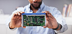 Circuit board, hands and technician with computer hardware, man in office with maintenance and electronics upgrade. Closeup, motherboard and CPU, engineering and electric repair with technology