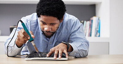 Buy stock photo Black man, soldering iron and fixing circuit board, computer hardware and maintenance with electronics upgrade. Tools, motherboard and CPU, engineering and electric repair with technology in office