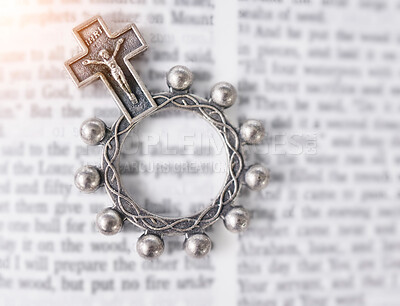 Buy stock photo Rosary, open book or bible study for faith, studying religion or mindfulness with holy spiritual scripture. Christian literature, background or story for education or knowledge on God or Jesus Christ
