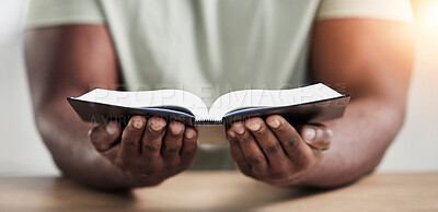 Bible, book reading and hands with closeup of religion study at home for worship and spiritual support. Faith, christian knowledge and person with gratitude, scripture education and god guidance