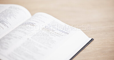 Closeup, bible or open book for faith, studying religion or healing with holy spiritual scripture. Christian literature, background or learning story for knowkedge education on God or Jesus Christ