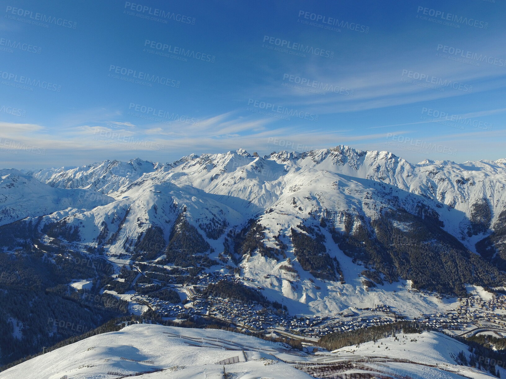 Buy stock photo Mountains, snow and nature with landscape and village, travel and adventure with winter, Earth and scenery. Arctic, alps and mockup space, cold environment and land, hiking path and buildings