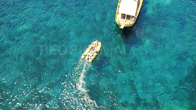 Buy stock photo People on boat from above, sailing in Greece and summer sun on ocean holiday, relax in freedom and nature. Yacht vacation, aerial view of travel and tropical cruise on sea adventure to Greek island.