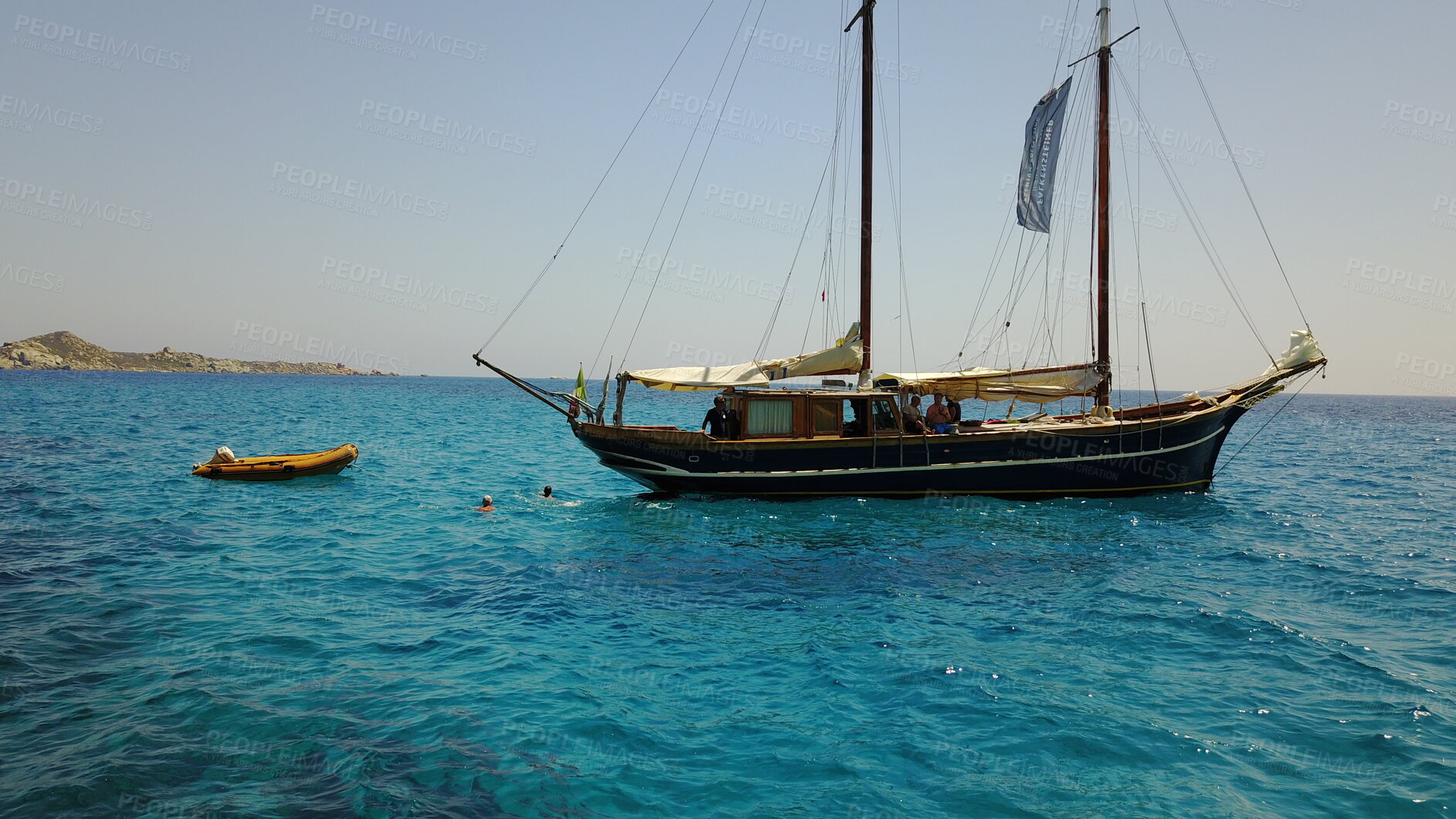 Buy stock photo Yacht, sailing in Greece and summer on ocean holiday, relax in freedom and people swimming in blue water. Boat vacation, travel in sun and tropical cruise on sea adventure with island beach fun.