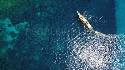 Buy stock photo Aerial, boat and sailing in water, summer on ocean holiday and relax in freedom with nature from above. Yacht vacation, travel in Croatia and tropical cruise on sea adventure to island in sunshine.