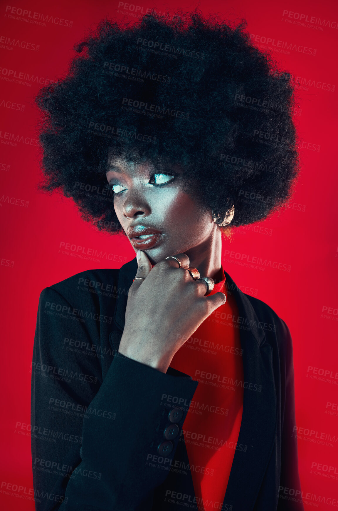 Buy stock photo Black woman, confidence and afro, hair and beauty with shine isolated on red background. Hairstyle, haircare and texture with growth, makeup with skin glow and African fashion model in a studio