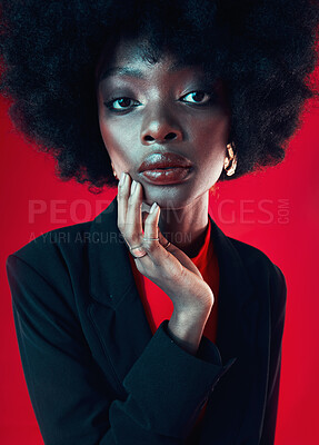 Buy stock photo Black woman, face and afro, hair and beauty, makeup and shine isolated on red background. Hairstyle, haircare and texture with growth, skin glow in portrait and confident African model in a studio