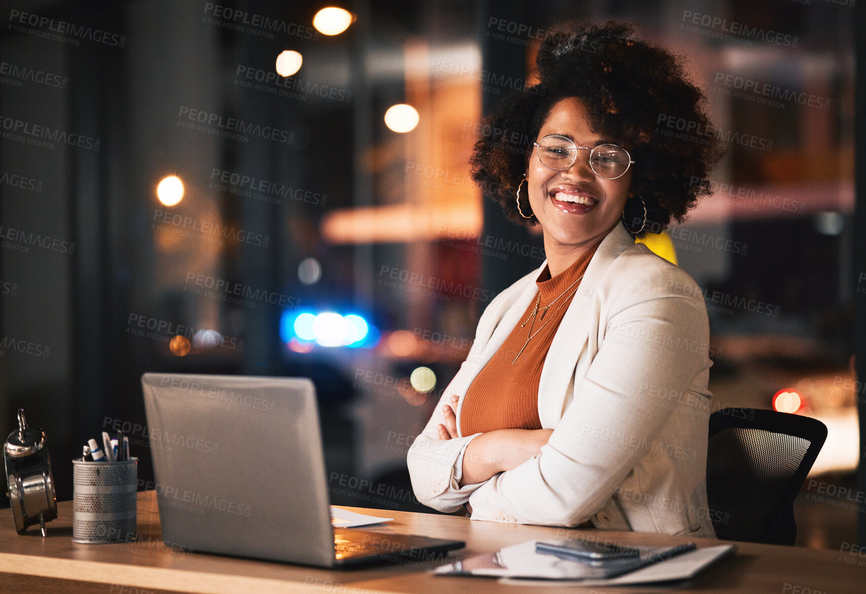 Buy stock photo Business woman, portrait and arms crossed on computer for night planning, marketing research and online management. Professional african person or happy editor on laptop with career mindset and bokeh