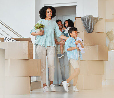 Buy stock photo Kids, new home or parents moving boxes in real estate property investment or rental apartment. Mother helping, proud father or excited children carrying or walking by a box in family house together 