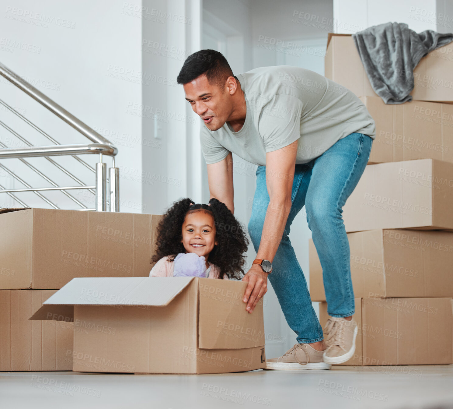 Buy stock photo Father, playing and girl in box on floor in living room for celebration, freedom and happiness of new home. Happy, dad and child excited and having fun with property, investment and real estate