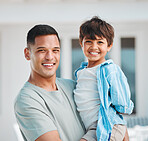 Happy, smile and portrait of a father with his child for bonding time outdoor together at home. Excited, love and young dad holding his boy kid with a positive attitude for fun at house in Mexico.