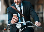 Businessman, phone in hands and bicycle outdoor for communication, travel and transportation. Entrepreneur person with a bike and smartphone for internet connection, carbon footprint and journey