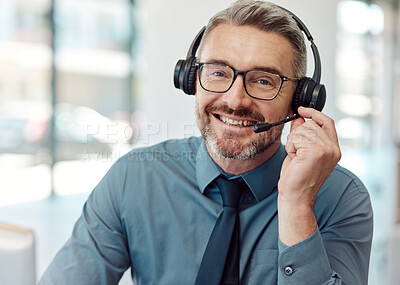 Buy stock photo Senior, happy man and portrait of call center agent with headphones in customer service or telemarketing at office. Mature businessman or consultant smile in online advice, help or contact us at desk