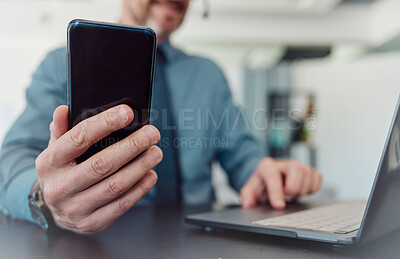 Buy stock photo Businessman, hands and phone with laptop in communication, social media or networking at the office. Closeup of man working on computer and mobile smartphone technology in telemarketing at workplace