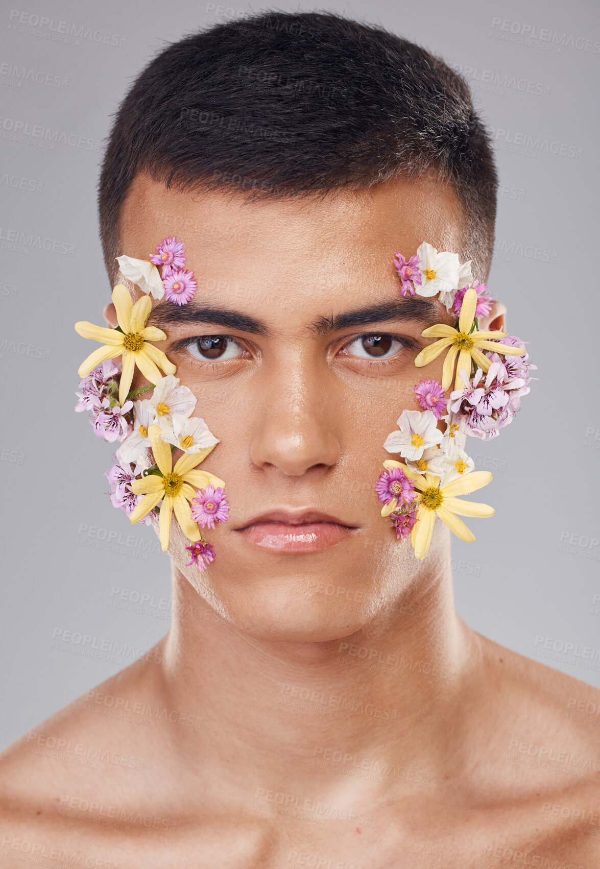 Buy stock photo Portrait, studio or man with flowers for beauty, natural cosmetics or wellness on white background. Nature aesthetic, face or creative model at eco friendly skincare or spring floral art for wellness