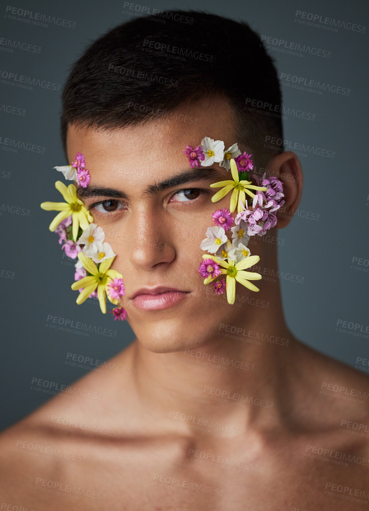 Buy stock photo Portrait, man and flowers, beauty and natural, cosmetics and headshot with art deco isolated on studio background. Nature aesthetic, face and dermatology, eco friendly skincare and clean with spring