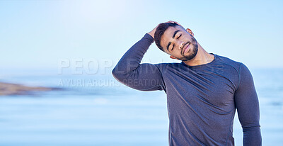 Buy stock photo Beach, exercise and man stretching neck for outdoor freedom, sports workout or advertising space. Blue sky mockup, ocean water and Indian person start relax training warm up, challenge or muscle care