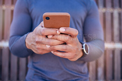 Buy stock photo Communication, phone and closeup of hands typing a text message on social media or mobile app. Technology, online and man scroll or chatting on the internet for blog or website with a cellphone.