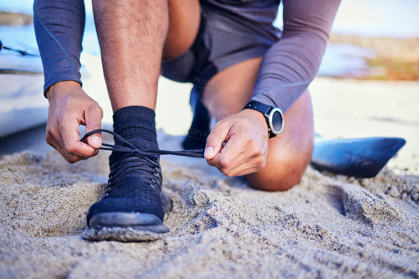 Buy stock photo Hands tie shoes, ocean and athlete start workout, training and kayak exercise outdoor. Sand, person and tying sneakers at beach to prepare for fitness, sports and healthy body for wellness in summer.