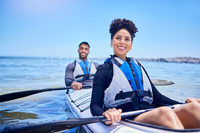 Water, man and woman in kayak for race at lake, beach or river for exercise in sports at sea. Ocean holiday, adventure and fitness, happy couple with smile rowing in canoe for training or challenge.