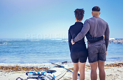 Buy stock photo Couple, kayak and outdoor for travel adventure at a beach with a partner for teamwork. Behind a man and woman with a canoe for water sports, banner space in sky and vacation or freedom in nature