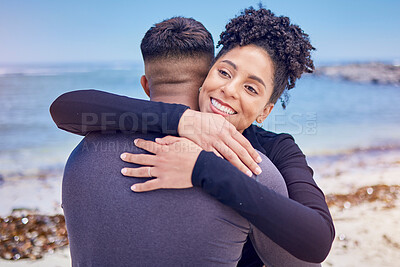 Buy stock photo Fitness, face and couple hug at a beach for sports, training and morning cardio in nature. Love, smile and happy woman embrace man at the ocean for running, workout or wellness exercise with support