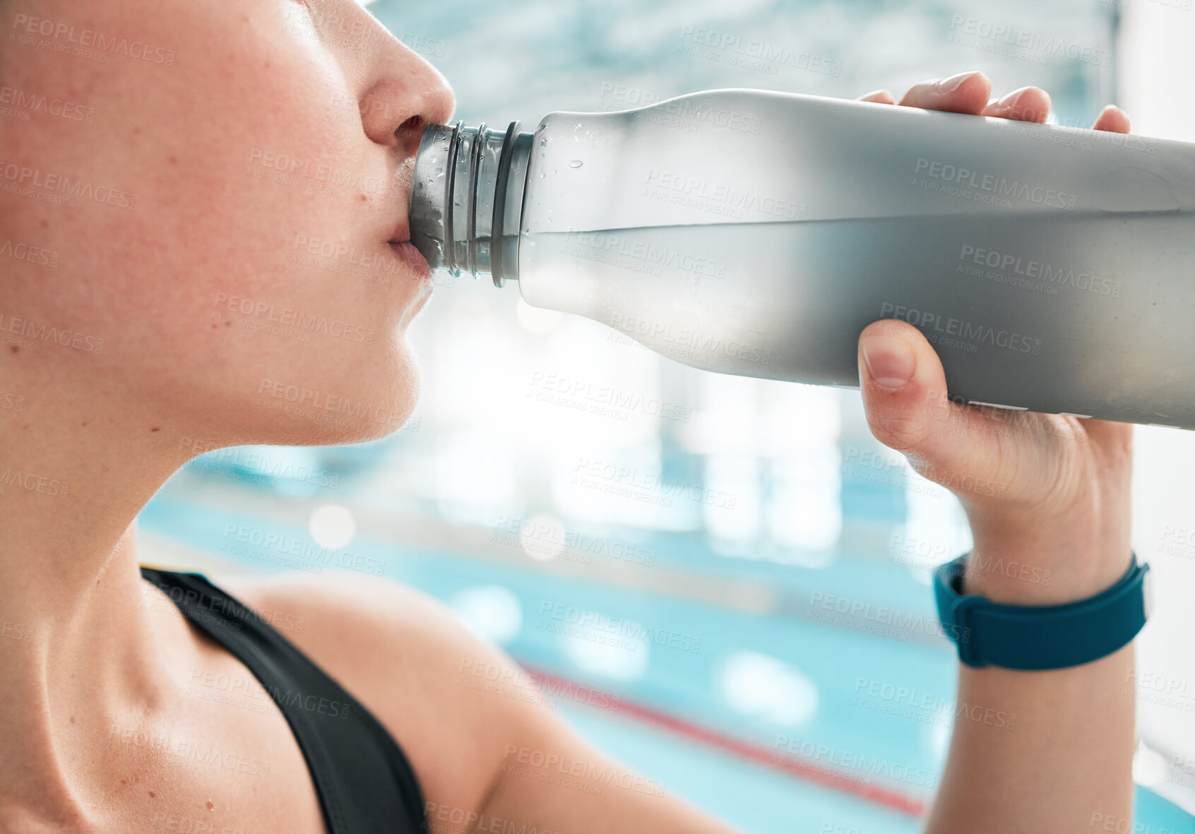 Buy stock photo Swimmer, bottle or woman drinking water to relax on break after exercise, workout or fitness training. Hydrate, closeup or sports girl athlete with liquid for wellness or health by swimming pool