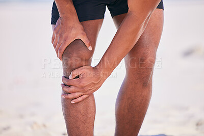 Buy stock photo Hands, knee pain and athlete at beach, accident and fitness exercise in sport workout outdoor. Legs, injury and arthritis of man, muscle problem and fibromyalgia in medical emergency for osteoporosis