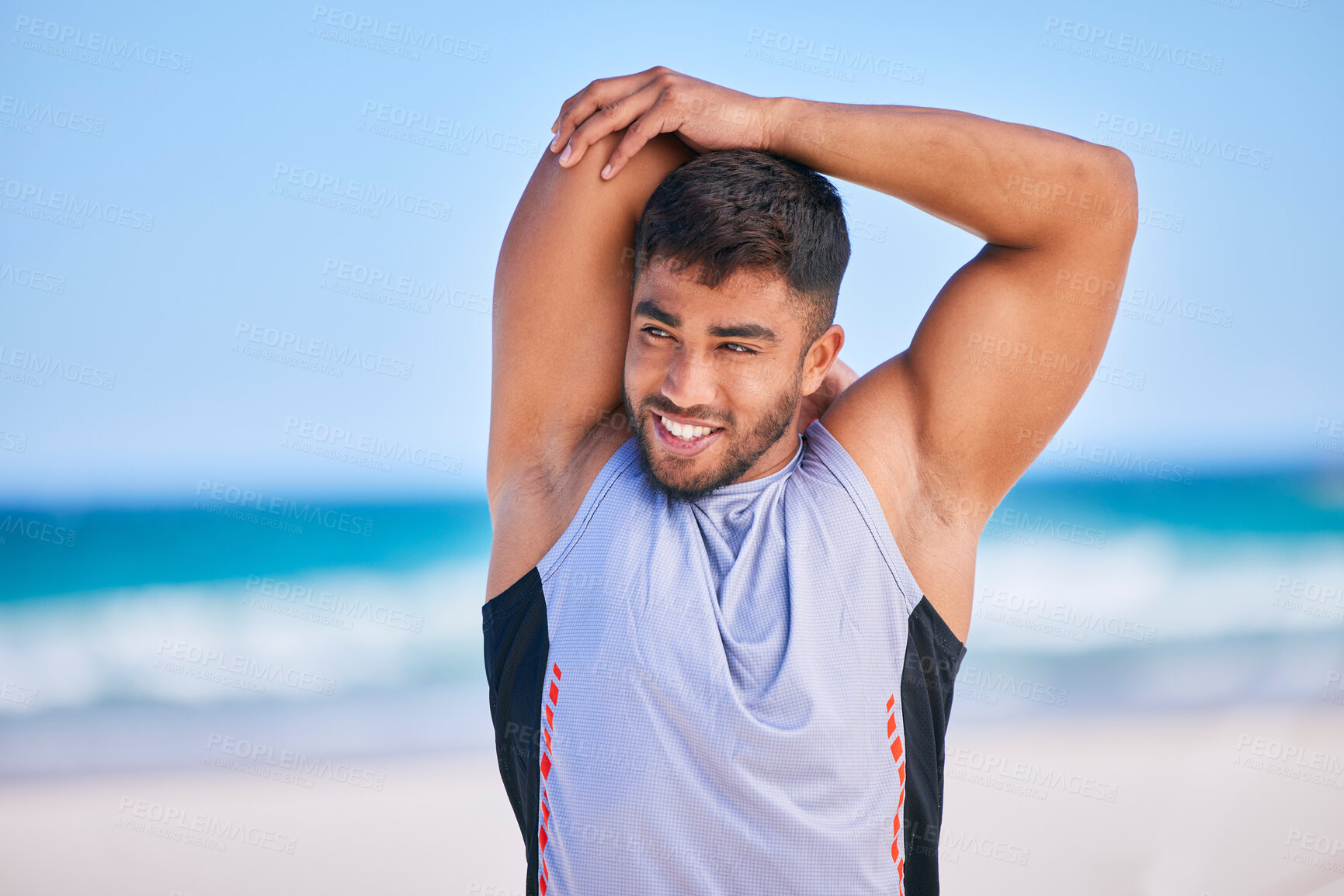 Buy stock photo Happy man, stretching and fitness on beach for workout, exercise or outdoor training in sports. Muscular, athlete or sporty male person smile in body warm up or preparation on ocean coast in nature